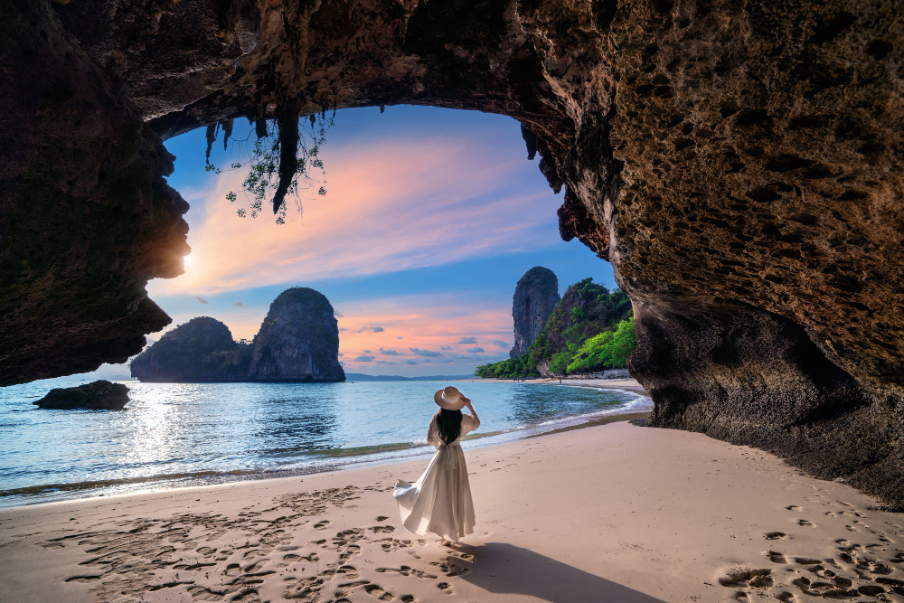 Woman walking on railay beach, krabi in thailand Phuket & Krabi Tour Packages Best Thailand Beach Holidays